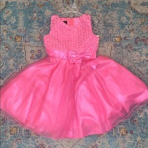 A pink formal kids dress